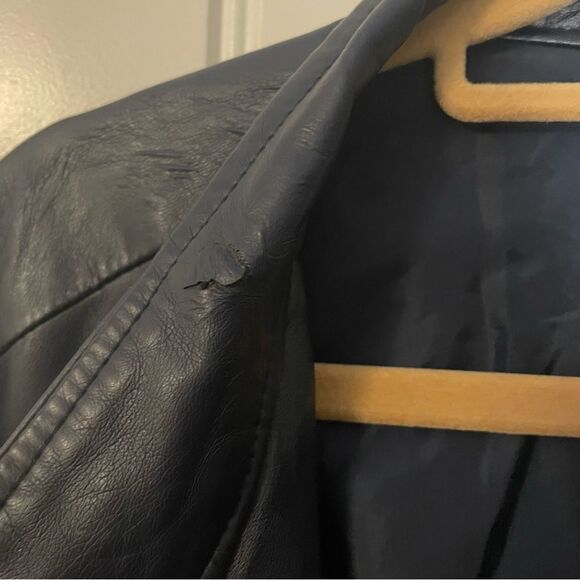 Navy blue, purple is some light. flawed item. Please see picture of spot on neck - Picture 5 of 7